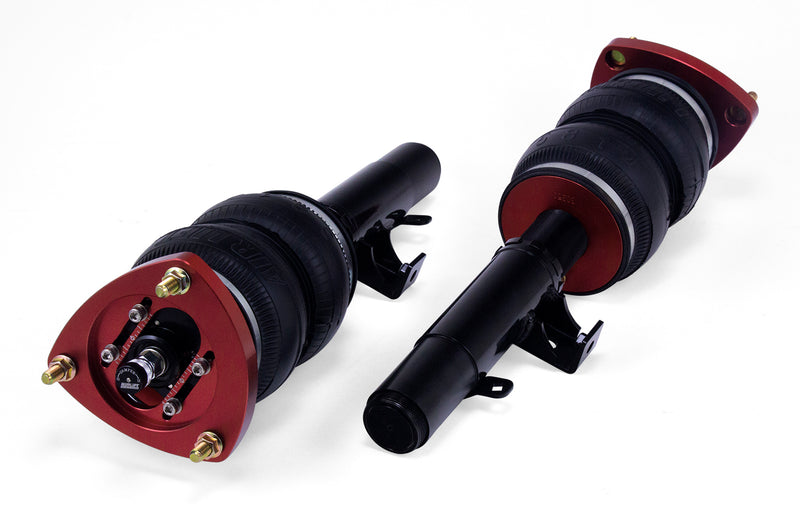 A pair of Air Lift Performance red accented monotube shocks with double bellows progressive rate air springs. Air suspension part
