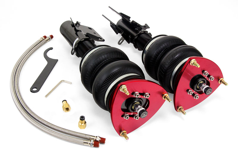 A pair of Air Lift Performance red accented monotube struts with double bellows progressive rate air springs with bolt-in camber plates and powdercoated black gloss steel brackets. A pair of stainless steel leader hoses and fittings. Air suspension kit part