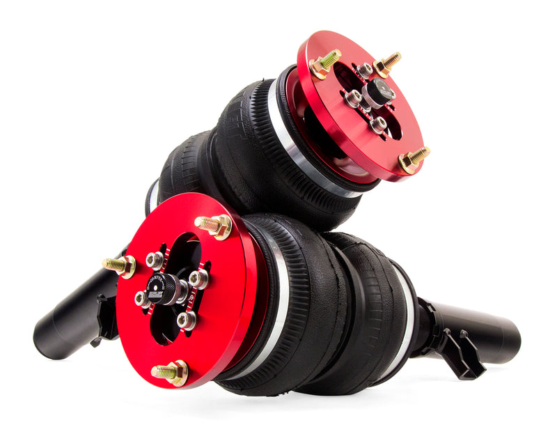 A pair of Air Lift Performance red accented threaded monotube struts with double bellows progressive rate air springs. Air suspension kit part