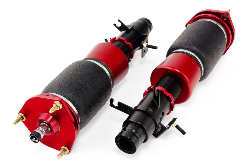 A pair of Air Lift Performance red accented threaded body air-over shocks with progressive rate sleeve-style air springs.  Air suspension kit part