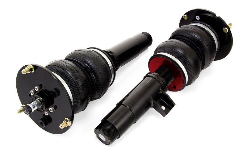 A pair of Air Lift Performance threaded body over-air struts with compact double bellows progressive rate air springs with bolt-in camber plates.  Air suspension kit part