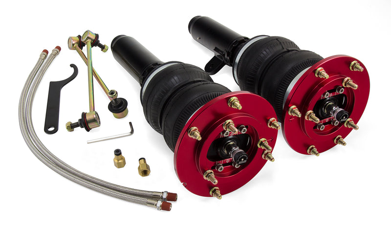 A pair of Air Lift Performance red accented high performance monotube struts with double bellows progressive rate air springs and camber plates, stainless steel leader hoses, sway bar endlinks and fittings.  Air suspension kit part