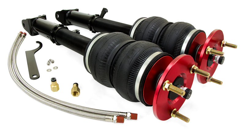 A pair of Air Lift Performance red accented monotube struts with double bellows progressive rate air springs, braided stainless steel leader hoses, powdercoated gloss black steel mounting brackets and fittings. Air suspension kit part