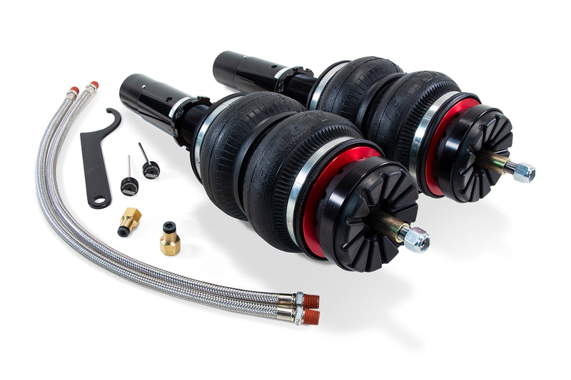 A pair of Air Lift Performance red accented threaded body monotube shocks with progressive rate double bellows air springs along with stainless steel leader hoses. Air suspension kit part