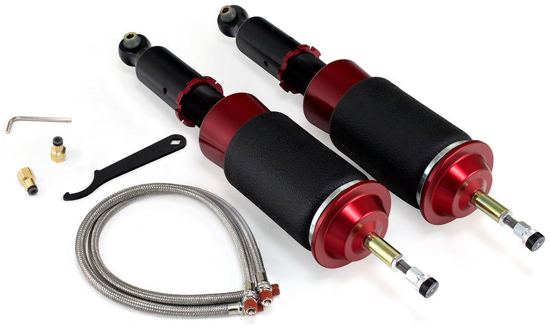 A pair of Air Lift Performance red accented threaded body air-over shocks with progressive rate sleeve-style air springs, braided stainless steel leader hoses and fittings. Air suspension kit part