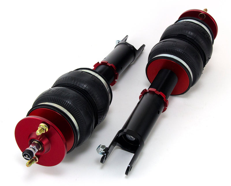 A pair of anodized red accented high performance monotube shocks with double bellows progressive rate air springs.  Air suspension kit part