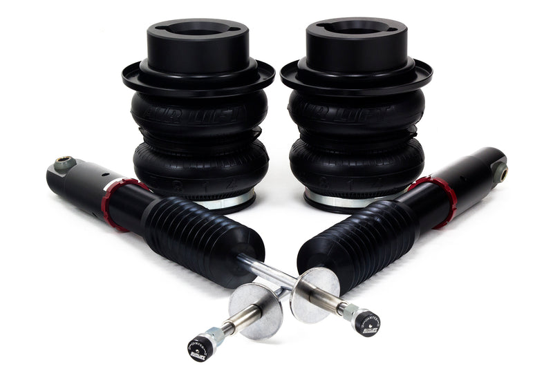 A pair of Air Lift Performance red accented high performance monotube shocks with double bellows progressive rate air springs with roll plates. Air suspension part