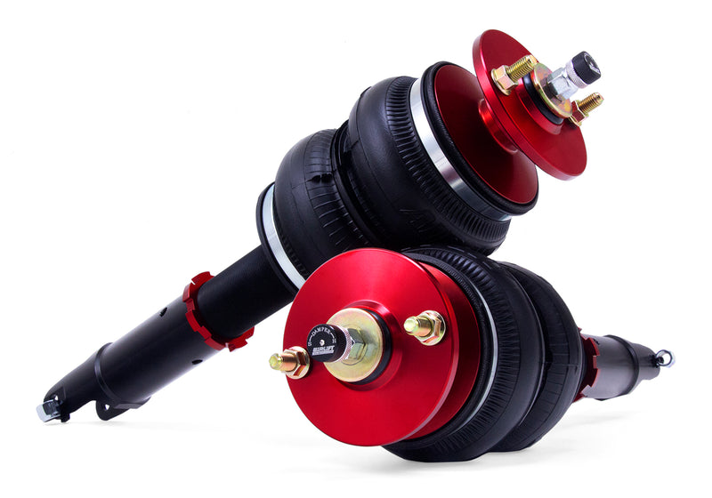 A pair of Air Lift Performance red accented air-over monotube struts with double bellows-style progressive rate air spring.  Air suspension kit part