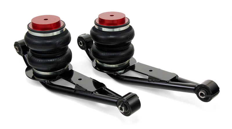 A pair of Air Lift Performance red accented  double bellows progressive rate air springs and lower control arms. Air suspension kit