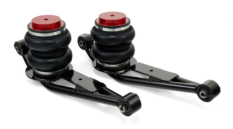 A pair of Air Lift Performance red accented double bellows progressive rate air springs and lower control arms. Air suspension kit