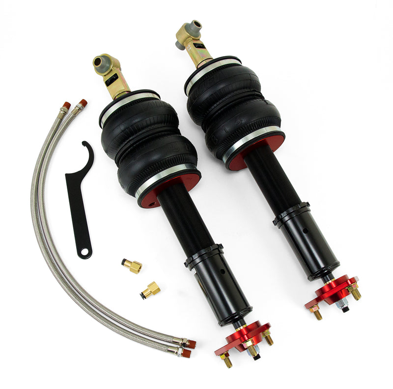 A pair of Air Lift Performance red accented monotube struts with double bellows progressive rate air springs along with stainless steel leader hoses, fittings and mounting hardware. Air suspension kit part