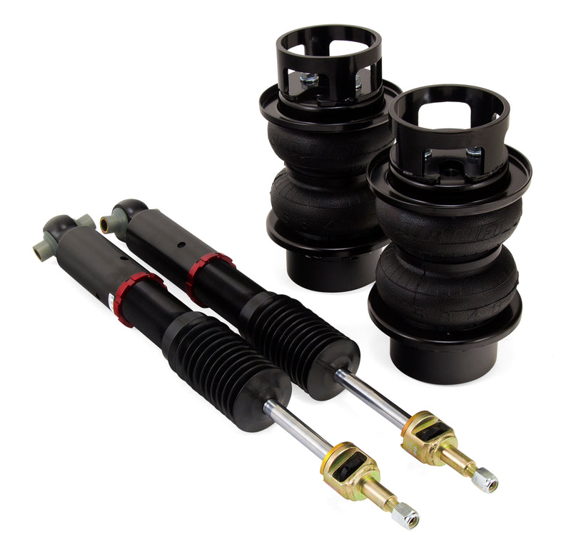 A pair of Air Lift Performance red accented high performance monotube shocks, compact double bellows progressive rate air springs with roll plates.  Air suspension kit part