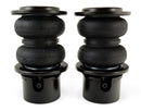 A pair of Air Lift Performance anodized aluminum accented black double bellows progressive rate air springs. Air suspension kit part