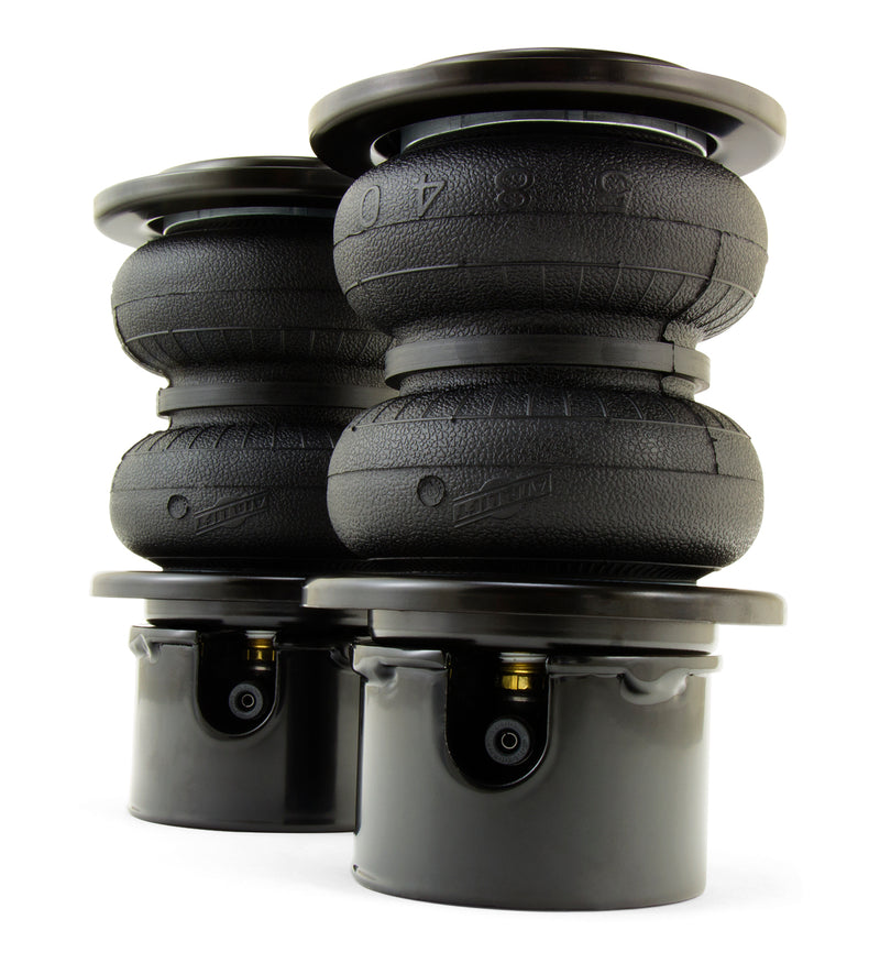 A pair of Air Lift Performance anodized aluminum accented black double bellows progressive rate air springs, roll plates and powdercoated gloss black steel brackets.. Air suspension kit part