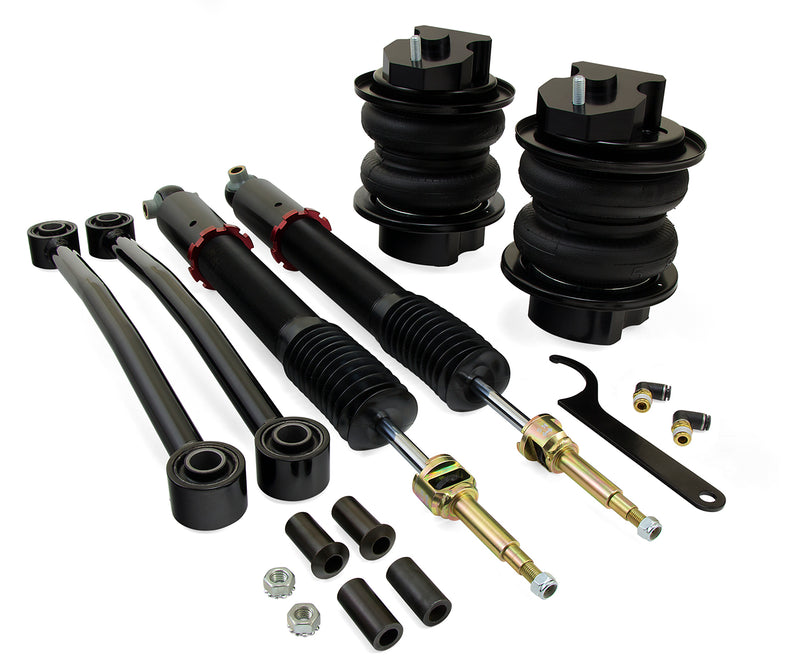 A pair of Air Lift Performance red accented threaded body air-over monotube shocks and black double bellows progressive rate air springs along with fittings and custom toe links. Part