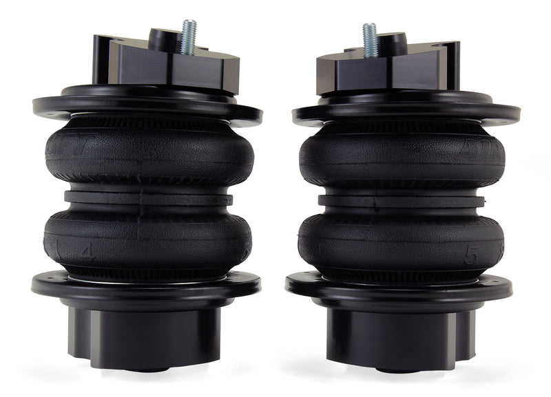 A pair of Air Lift Performance black double bellows progressive rate air springs.