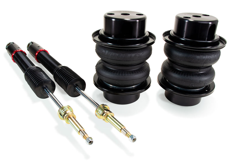 A pair of Air Lift Performance red accented monotube shocks and anodized aluminum accented black double bellows progressive rate air springs.  Air suspension kit part