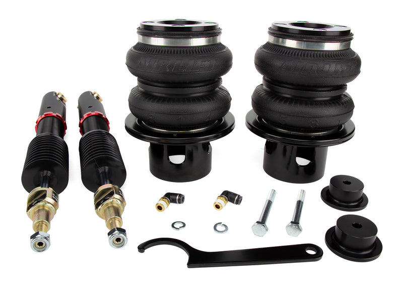 A pair of Air Lift Performance high performance monotube struts with black double bellows progressive rate air springs with anodized aluminum accents and powdercoated gloss black mounting brackets. Fitting and mounting hardware. Air suspension kit part