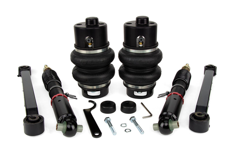 A pair of Air Lift Performance red accented high performance monotube shocks with anodized aluminum accented double bellows progressive rate air springs with mounting hardware and fittings.  Air suspension kit part