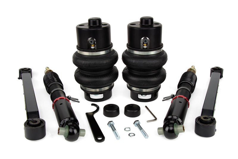 A pair of Air Lift Performance red accented high performance monotube shocks with anodized aluminum accented double bellows progressive rate air springs with mounting hardware and fittings. Air suspension kit part