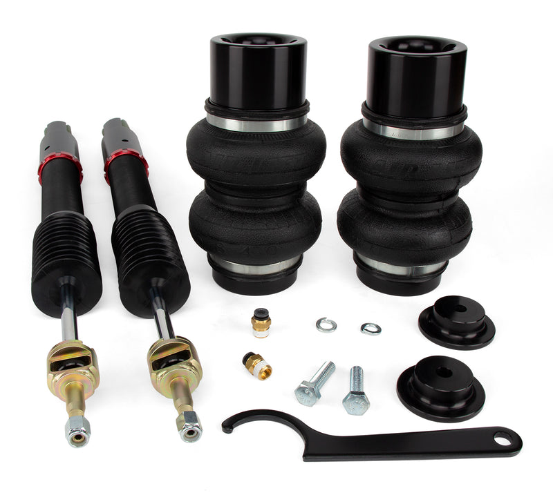 A pair of Air Lift Performance red accented high performance monotube struts with double bellows progressive rate air springs and fittings. Air suspension kit part