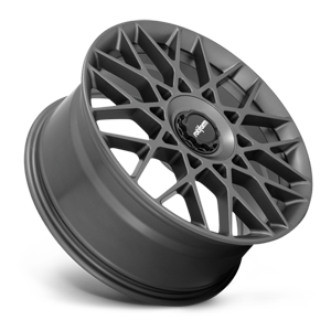 Tilted side view of a Rotiform BLQ-C monoblock cast aluminum multi spoke automotive wheel in a matte anthracite finish with a black center cap with a silver Rotiform logo.