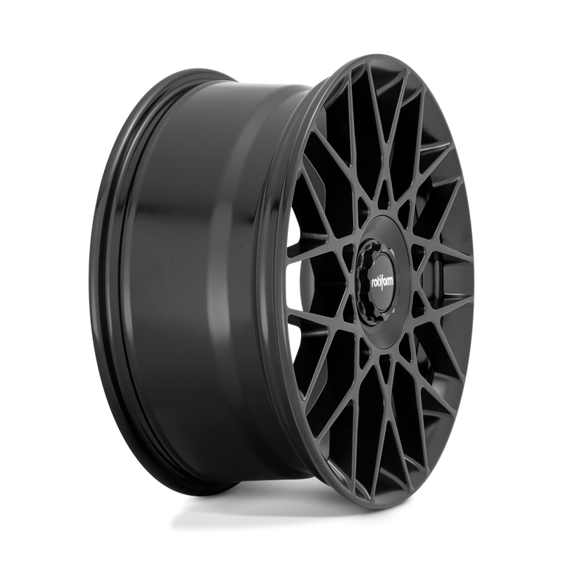 Side view of a Rotiform BLQ-C monoblock cast aluminum multi spoke automotive wheel in a matte black finish with a black center cap with a silver Rotiform logo.