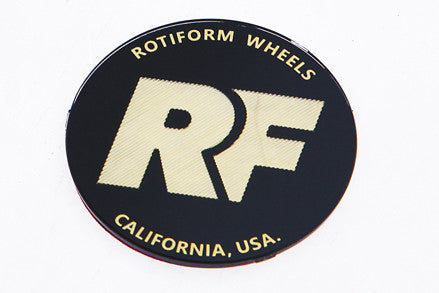 Rotiform's black and gold RF center cap insert for threaded hex nut.