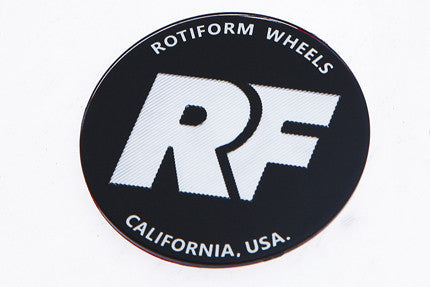 Rotiform's black and silver RF center cap insert for threaded hex nut.