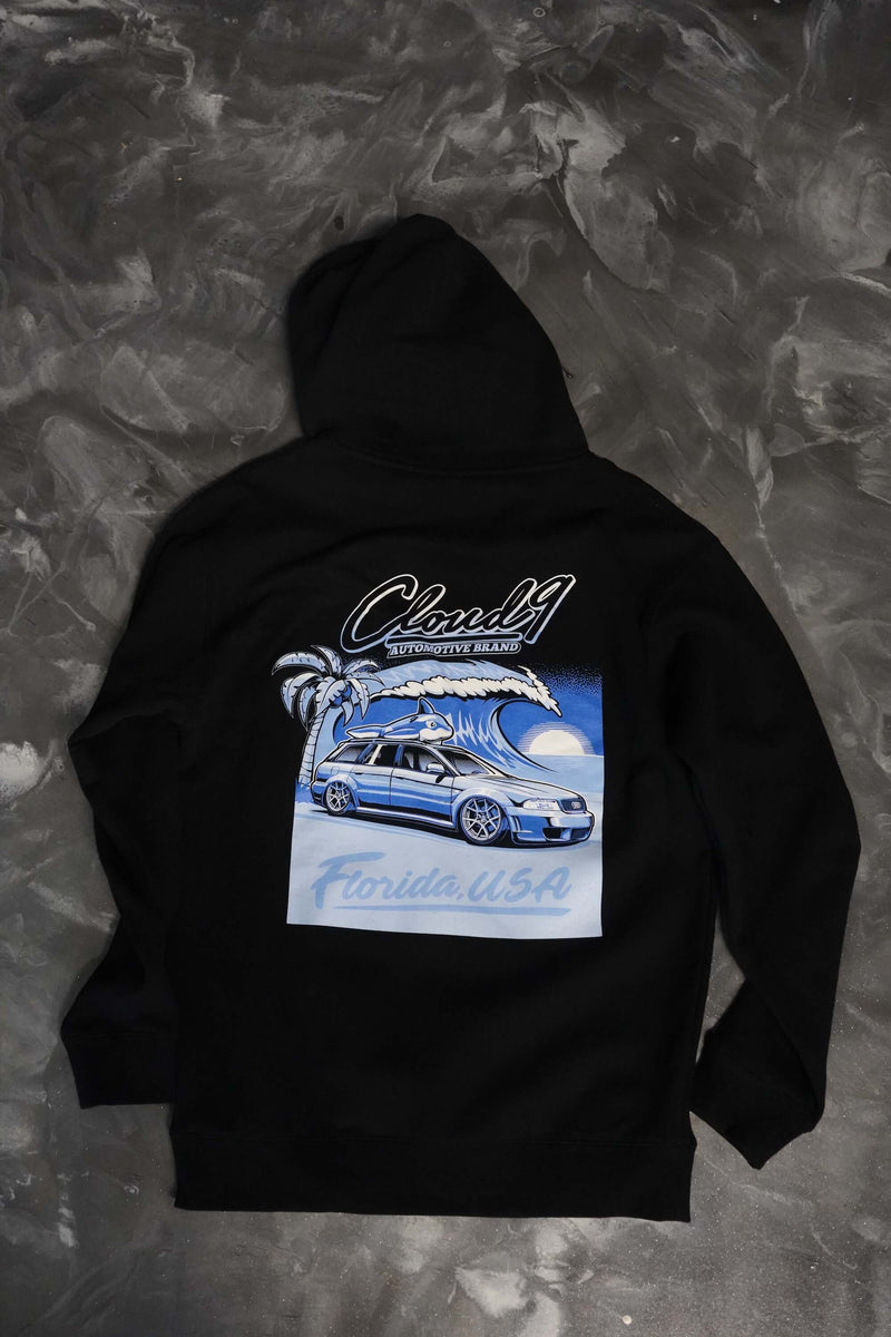 Back of a black hoodie with the blue Audi Florida USA graphic to the center along with the Cloud 9 Automotive Brand logo above.