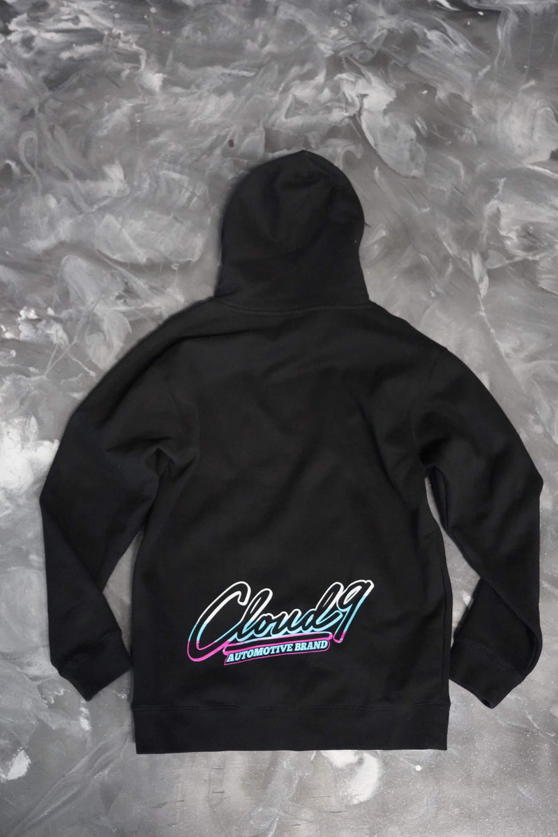 Rear of a black hoodie with the full color Cloud 9 Automotive Brand logo to the bottom edge.