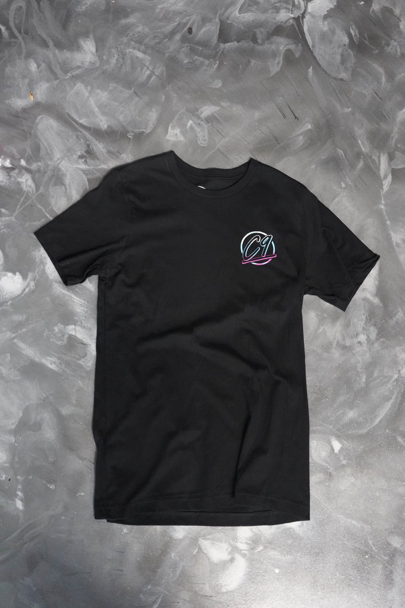 Front of a black T-shirt with the Cloud 9 Automotive Brand round logo below the left shoulder.