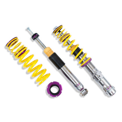1 assembled chrome body coilover with yellow springs, 1 chrome body coil over, 1 yellow spring and 1 purple fitting.