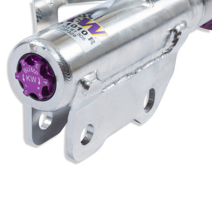 End of chrome body coilover showing close up of purple bump adjustment knob.