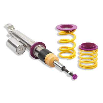 1 chrome body coilover  with purple fittings and purple height adjustment knob, 2 yellow springs with purple fittings.