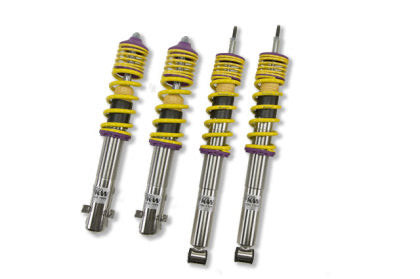 4 vehicle suspension chrome body coilovers with yellow springs and purple accented fittings.