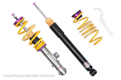 1 chrome coilover with yellow spring and purple accented fittings, 1 black coilover and 1 yellow spring with purple accented fitting along with 1 coilover adjustment tool.