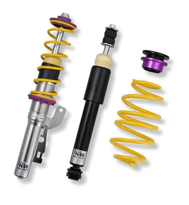 1 vehicle suspension chrome body coilover with yellow spring, 1 black coilover body and 1 yellow spring with 1 end fitting.