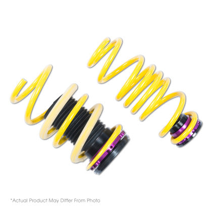 2 yellow vehicle suspension height adjustable springs