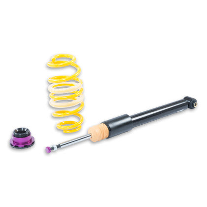 1 black body coilover with 1 yellow spring and 1 purple and black fitting.