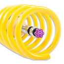 End of yellow coilover spring showing purple rebound adjustment knob.