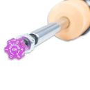 End of black coilover strut showing purple rebound adjustment knob.