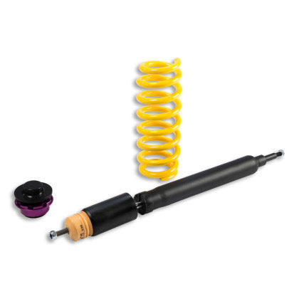 1 black vehicle suspension coilover with yellow spring and adjustable spring perch fitting.