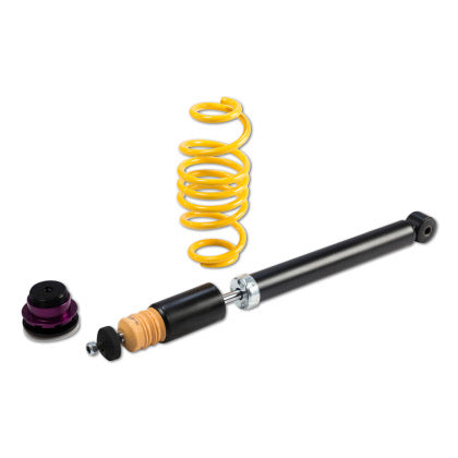 1 vehicle suspension black body coilover, 1 yellow spring and 1 black and purple accented fitting.