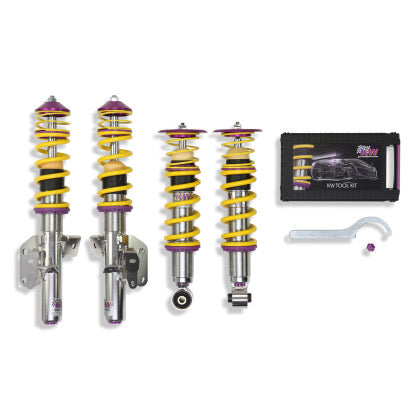 4 fully assembled vehicle suspension chrome body coilovers with yellow springs and purple accented fittings, 1 coilover adjustment tool and storage box.