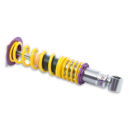 1 assembled vehicle suspension chrome coilover with yelllow spring and purple fittings.