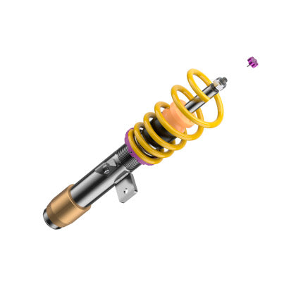 1 vehicle suspension chrome and brass colored body coilover with yellow spring and purple adjustment knob at end of strut.