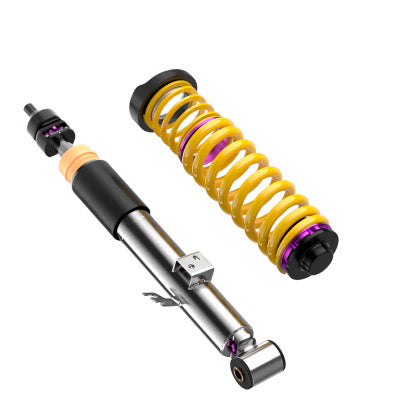 1 chrome body coilover with adjuster fitting at end of strut and 1 yellow spring with black and purple fittings.