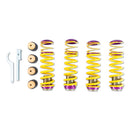 4 yellow vehicle suspension height adjustable springs with purple and crhome and fittings and threaded adjusters, with 4 installation fittings and install tools