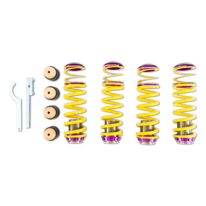4 yellow vehicle suspension height adjustable springs with purple and crhome and fittings and threaded adjusters, with 4 installation fittings and install tools